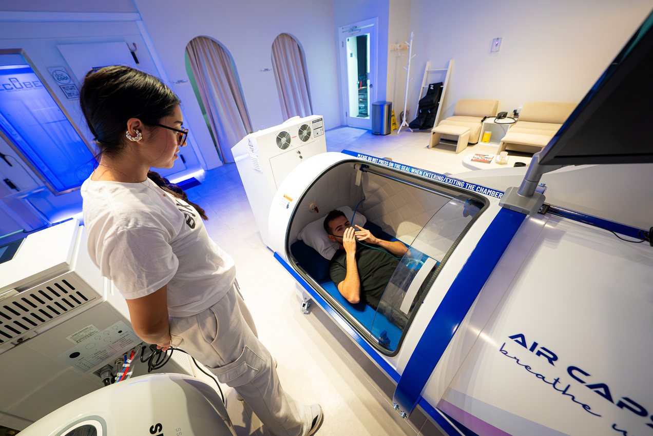 A member in the hyperbaric chamber at BOXR Health