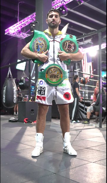Ermal Hadribreaj with his WBC belts