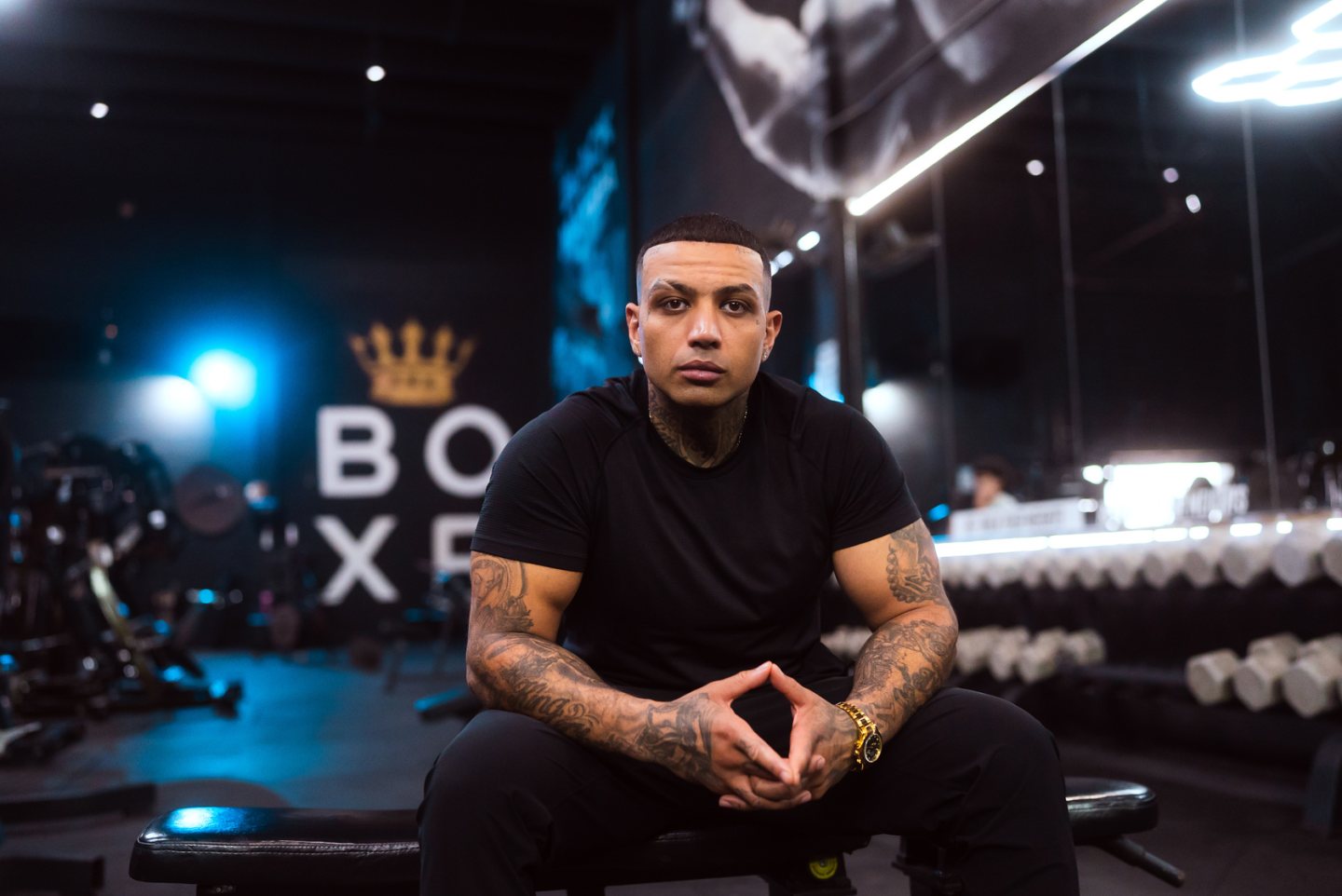 Mateo Attalla, founder of BOXR, seated in the gym